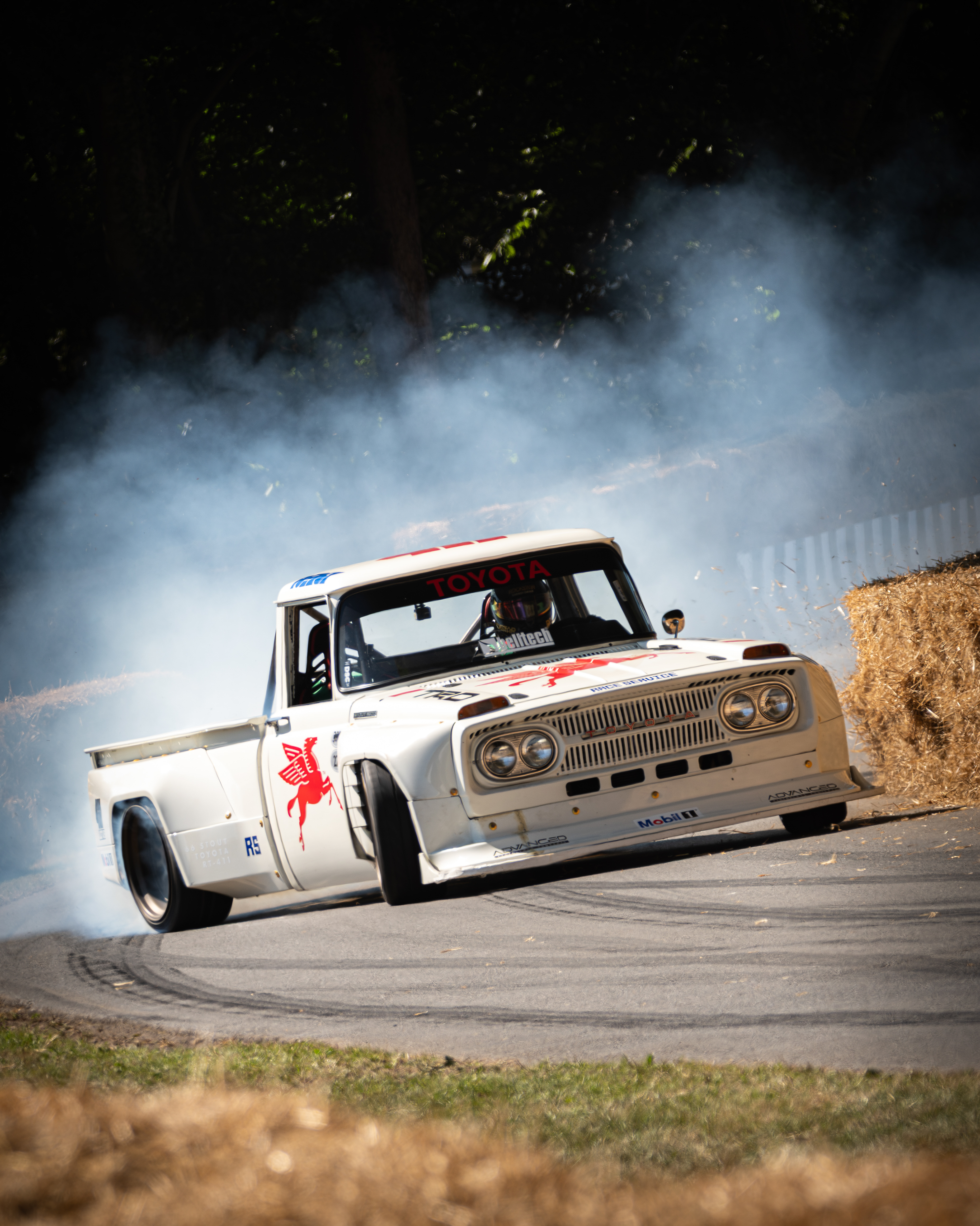Ryan Tuerck drifting his slammed 1966 Toyota Stout truck at the 2025 Goodwood Festival of Speed